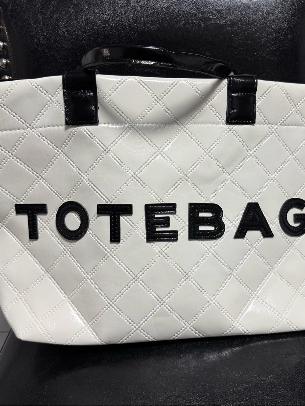 White Quilted Tote Bag with Black Accents